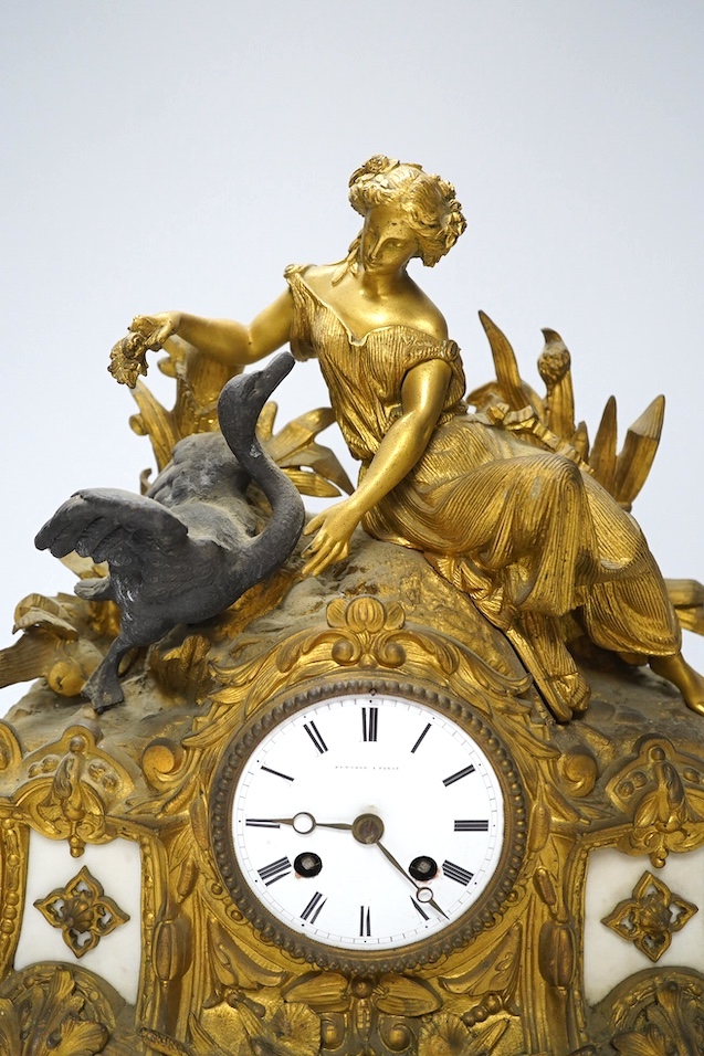 A Louis XV style gilt bronze mantel clock, 41cm wide, 35cm high. Condition - one replacement foot, fair but very dusty, not tested as working